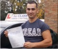 Vasil with Driving test pass certificate